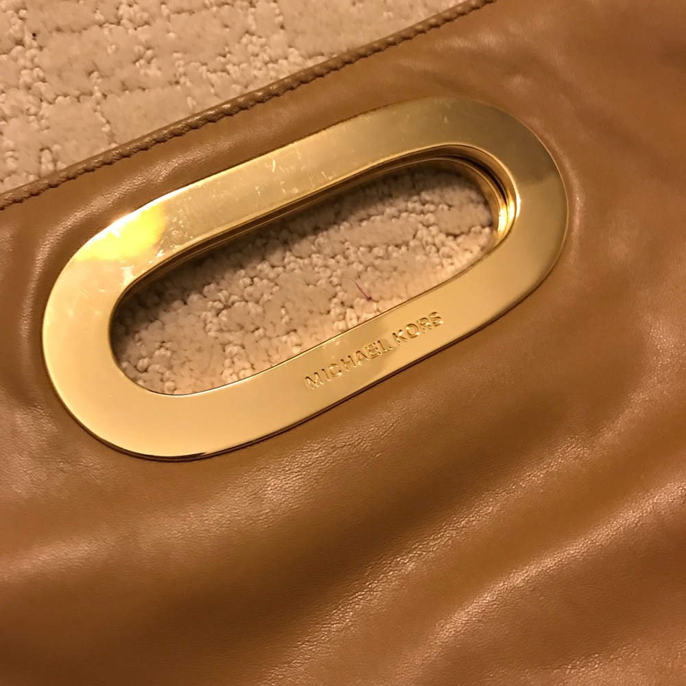 Michael Kors tan clutch bag. Great condition!